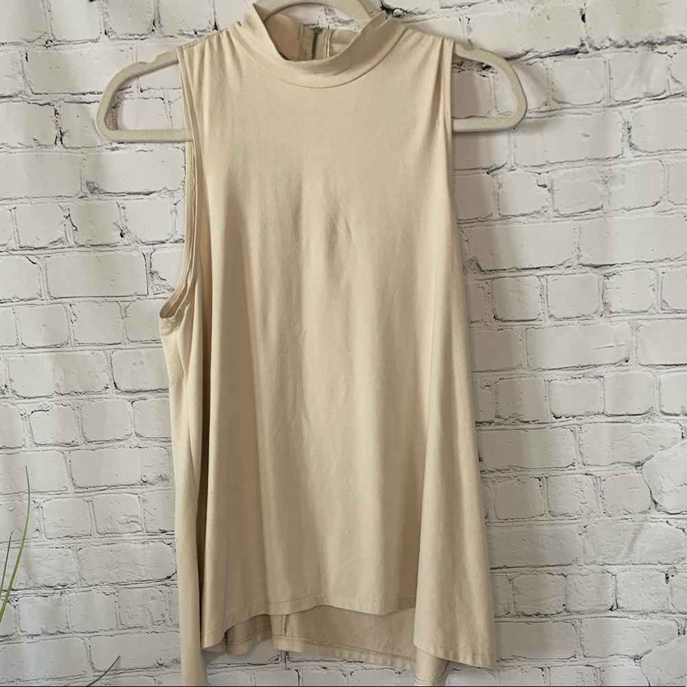 70’s style flared tank top with turtleneck